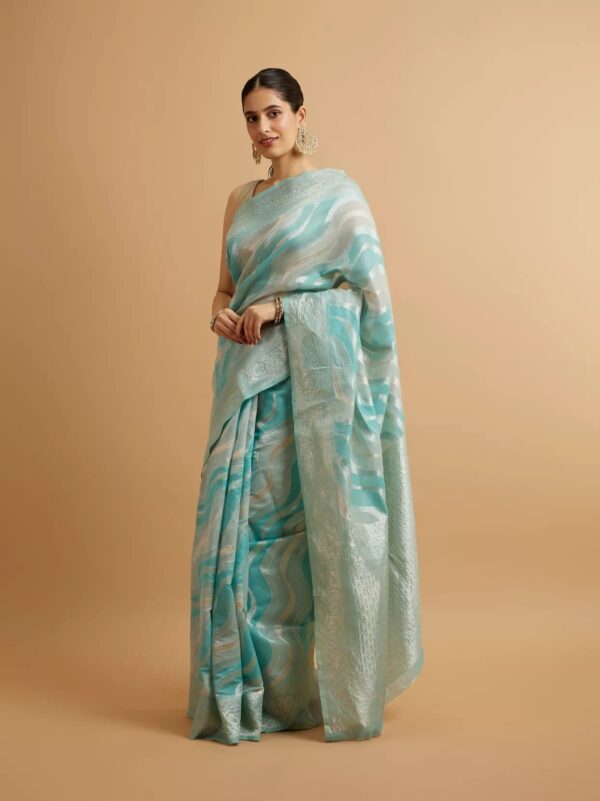 Radiant Meadow Green Silk Saree with Zari Accents